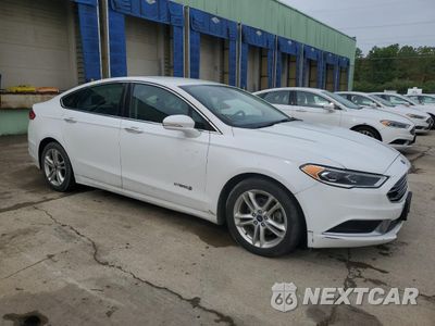 Czwarte zdjęcie samochodu z boku: 2018 FORD FUSION SE HYBRID VIN:3FA6P0LU3JR118815 - miniatura