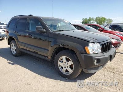 Czwarte zdjęcie samochodu z boku: 2006 JEEP GRAND CHEROKEE LAREDO VIN:1J4HR48N66C360018 - miniatura