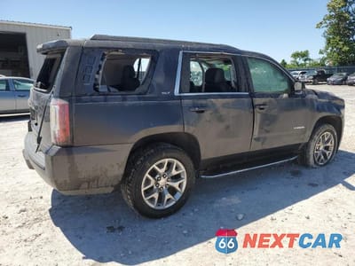 Trzecie zdjęcie samochodu z tyłu: 2017 GMC YUKON SLT VIN:1GKS2BKC6HR338598 - miniatura