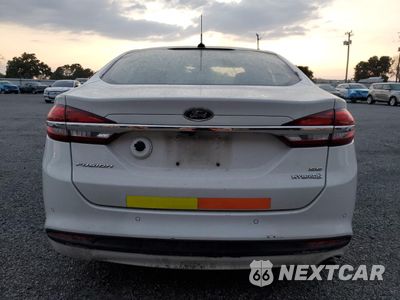 Zdjęcie 6 z 12 samochodu: 2017 FORD FUSION SE HYBRID VIN:3FA6P0LU3HR359607 - miniatura
