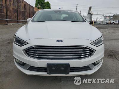 Piąte zdjęcie samochodu w środku: 2017 FORD FUSION SE HYBRID VIN:3FA6P0LU2HR409753 - miniatura