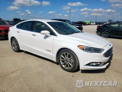 Czwarte zdjęcie samochodu z boku: 2017 FORD FUSION SE HYBRID VIN:3FA6P0LU2HR400728 - miniatura