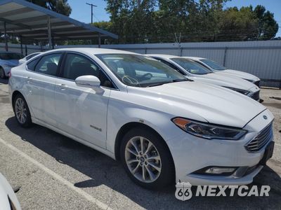 Czwarte zdjęcie samochodu z boku: 2017 FORD FUSION SE HYBRID VIN:3FA6P0LU0HR409329 - miniatura
