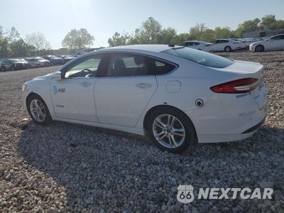 Trzecie zdjęcie samochodu z tyłu: 2018 FORD FUSION SE HYBRID VIN:3FA6P0LU4JR171863 - miniatura