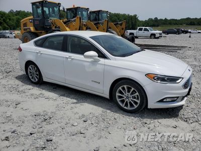 Czwarte zdjęcie samochodu z boku: 2017 FORD FUSION SE HYBRID VIN:3FA6P0LU0HR409654 - miniatura