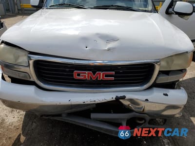 Zdjęcie 12 z 15 samochodu: 2000 GMC YUKON XL C2500 VIN:3GKGC26U8YG226472 - miniatura