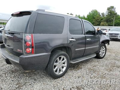 Trzecie zdjęcie samochodu z tyłu: 2011 GMC YUKON DENALI VIN:1GKS1EEFXBR116244 - miniatura