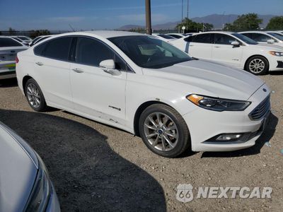 Czwarte zdjęcie samochodu z boku: 2017 FORD FUSION SE HYBRID VIN:3FA6P0LUXHR409189 - miniatura