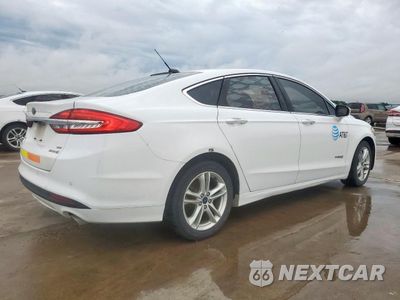 Trzecie zdjęcie samochodu z tyłu: 2018 FORD FUSION SE HYBRID VIN:3FA6P0LU7JR118655 - miniatura