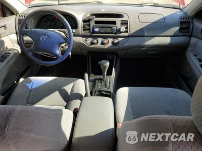 Zdjęcie 8 z 12 samochodu: 2004 TOYOTA CAMRY LE VIN:4T1BF30K34U586827 - miniatura