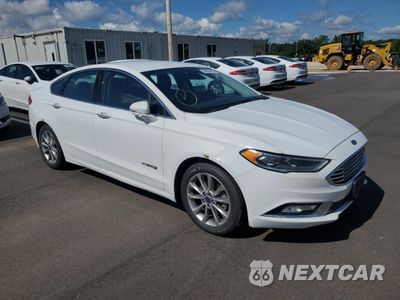 Czwarte zdjęcie samochodu z boku: 2017 FORD FUSION SE HYBRID VIN:3FA6P0LU1HR410084 - miniatura