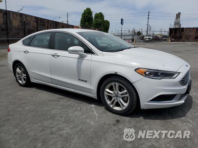Czwarte zdjęcie samochodu z boku: 2018 FORD FUSION SE HYBRID VIN:3FA6P0LU5JR278730 - miniatura