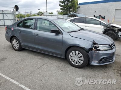 Czwarte zdjęcie samochodu z boku: 2015 VOLKSWAGEN JETTA BASE VIN:3VW2K7AJ1FM269372 - miniatura