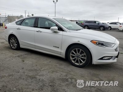 Czwarte zdjęcie samochodu z boku: 2017 FORD FUSION SE HYBRID VIN:3FA6P0LU2HR409753 - miniatura