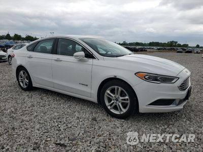 Czwarte zdjęcie samochodu z boku: 2018 FORD FUSION SE HYBRID VIN:3FA6P0LUXJR171852 - miniatura
