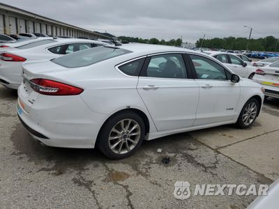 Trzecie zdjęcie samochodu z tyłu: 2017 FORD FUSION SE HYBRID VIN:3FA6P0LU1HR359685 - miniatura