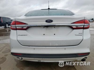 Zdjęcie 6 z 12 samochodu: 2018 FORD FUSION SE HYBRID VIN:3FA6P0LU9JR129799 - miniatura