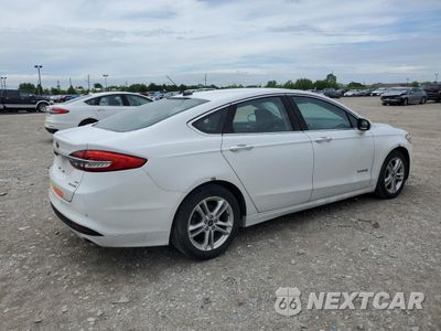 Trzecie zdjęcie samochodu z tyłu: 2018 FORD FUSION SE HYBRID VIN:3FA6P0LU7JR172036 - miniatura