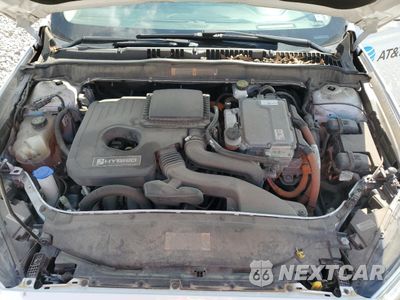 Zdjęcie 11 z 13 samochodu: 2018 FORD FUSION SE HYBRID VIN:3FA6P0LU6JR171847 - miniatura