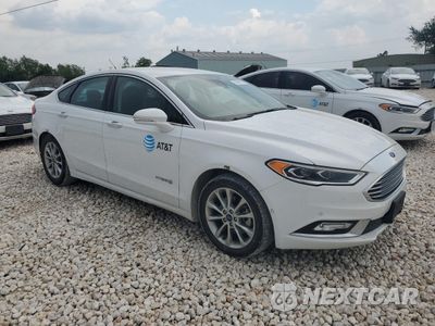 Czwarte zdjęcie samochodu z boku: 2017 FORD FUSION SE HYBRID VIN:3FA6P0LU9HR145852 - miniatura