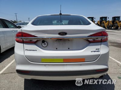 Zdjęcie 6 z 12 samochodu: 2017 FORD FUSION SE HYBRID VIN:3FA6P0LU9HR409684 - miniatura
