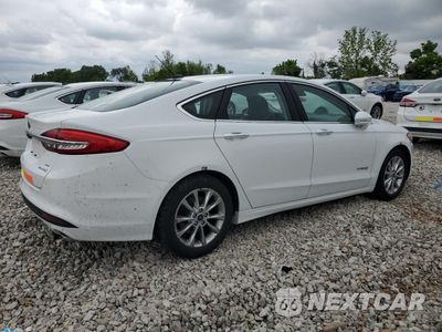 Trzecie zdjęcie samochodu z tyłu: 2017 FORD FUSION SE HYBRID VIN:3FA6P0LU9HR409071 - miniatura