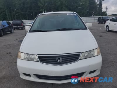 Piąte zdjęcie samochodu w środku: 2000 HONDA ODYSSEY EX VIN:2HKRL1878YH559901 - miniatura