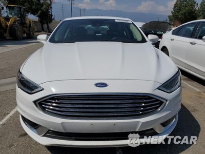 Piąte zdjęcie samochodu w środku: 2018 FORD FUSION SE HYBRID VIN:3FA6P0LU5JR278632 - miniatura