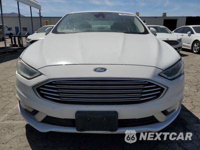 Piąte zdjęcie samochodu w środku: 2017 FORD FUSION SE HYBRID VIN:3FA6P0LU4HR409737 - miniatura