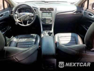 Zdjęcie 8 z 13 samochodu: 2018 FORD FUSION SE HYBRID VIN:3FA6P0LU2JR118658 - miniatura