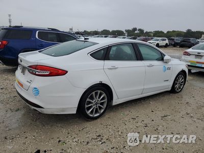 Trzecie zdjęcie samochodu z tyłu: 2017 FORD FUSION SE HYBRID VIN:3FA6P0LU6HR359584 - miniatura