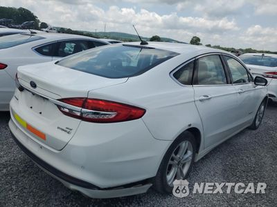 Trzecie zdjęcie samochodu z tyłu: 2018 FORD FUSION SE HYBRID VIN:3FA6P0LUXJR118827 - miniatura