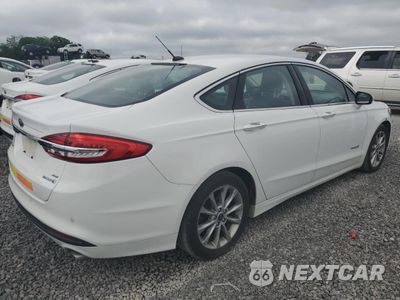 Trzecie zdjęcie samochodu z tyłu: 2017 FORD FUSION SE HYBRID VIN:3FA6P0LU3HR410104 - miniatura