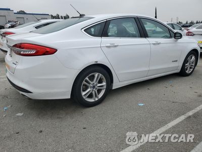 Trzecie zdjęcie samochodu z tyłu: 2018 FORD FUSION SE HYBRID VIN:3FA6P0LUXJR172144 - miniatura