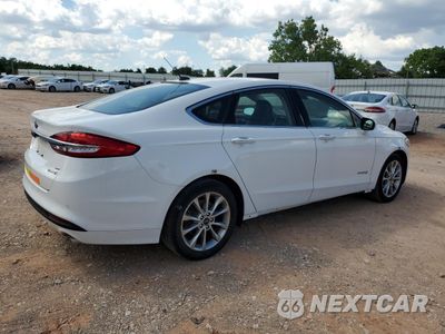 Trzecie zdjęcie samochodu z tyłu: 2017 FORD FUSION SE HYBRID VIN:3FA6P0LU6HR409450 - miniatura