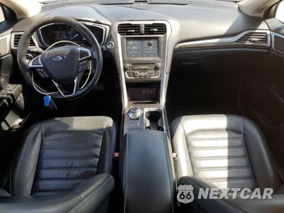Zdjęcie 8 z 12 samochodu: 2017 FORD FUSION SE HYBRID VIN:3FA6P0LUXHR409130 - miniatura