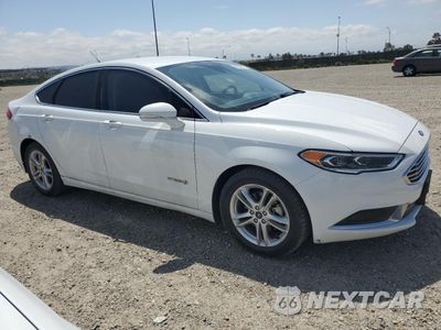 Czwarte zdjęcie samochodu z boku: 2018 FORD FUSION SE HYBRID VIN:3FA6P0LU3JR278614 - miniatura