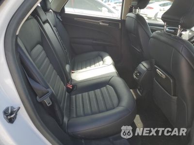 Zdjęcie 10 z 12 samochodu: 2018 FORD FUSION SE HYBRID VIN:3FA6P0LU3JR171787 - miniatura