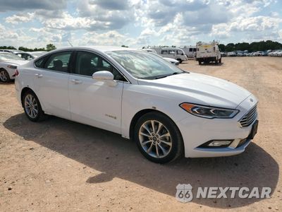 Czwarte zdjęcie samochodu z boku: 2017 FORD FUSION SE HYBRID VIN:3FA6P0LU6HR409450 - miniatura