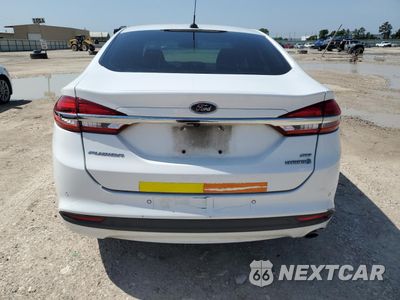 Zdjęcie 6 z 12 samochodu: 2018 FORD FUSION SE HYBRID VIN:3FA6P0LU6JR171900 - miniatura