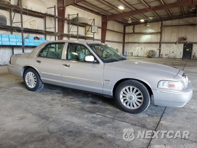 Czwarte zdjęcie samochodu z boku: 2010 MERCURY GRAND MARQUIS LS VIN:2MEBM7FV9AX622090 - miniatura