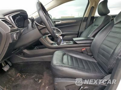 Zdjęcie 7 z 13 samochodu: 2017 FORD FUSION SE HYBRID VIN:3FA6P0LU8HR409014 - miniatura