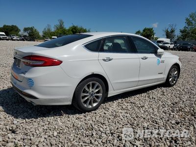 Trzecie zdjęcie samochodu z tyłu: 2017 FORD FUSION SE HYBRID VIN:3FA6P0LU0HR409069 - miniatura