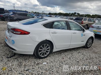 Trzecie zdjęcie samochodu z tyłu: 2017 FORD FUSION SE HYBRID VIN:3FA6P0LUXHR359622 - miniatura