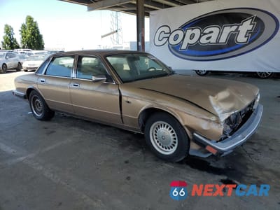 Czwarte zdjęcie samochodu z boku: 1990 JAGUAR VANDENPLAS VIN:SAJKY1747LC613849 - miniatura