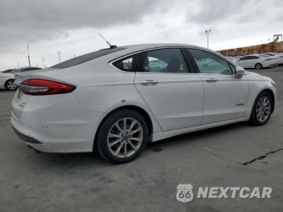 Trzecie zdjęcie samochodu z tyłu: 2017 FORD FUSION SE HYBRID VIN:3FA6P0LU1HR409324 - miniatura