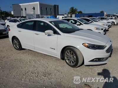 Czwarte zdjęcie samochodu z boku: 2017 FORD FUSION SE HYBRID VIN:3FA6P0LU3HR409468 - miniatura