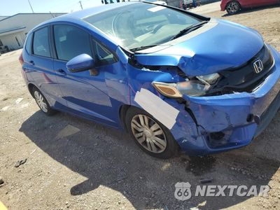 Czwarte zdjęcie samochodu z boku: 2015 HONDA FIT LX VIN:3HGGK5H50FM780370 - miniatura