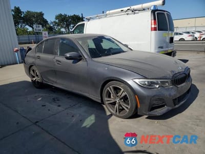Czwarte zdjęcie samochodu z boku: 2020 BMW 330I VIN:3MW5R1J01L8B18419 - miniatura
