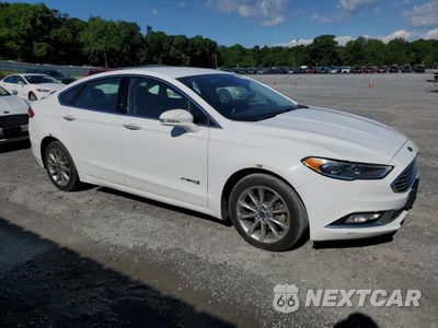 Czwarte zdjęcie samochodu z boku: 2017 FORD FUSION SE HYBRID VIN:3FA6P0LUXHR409211 - miniatura